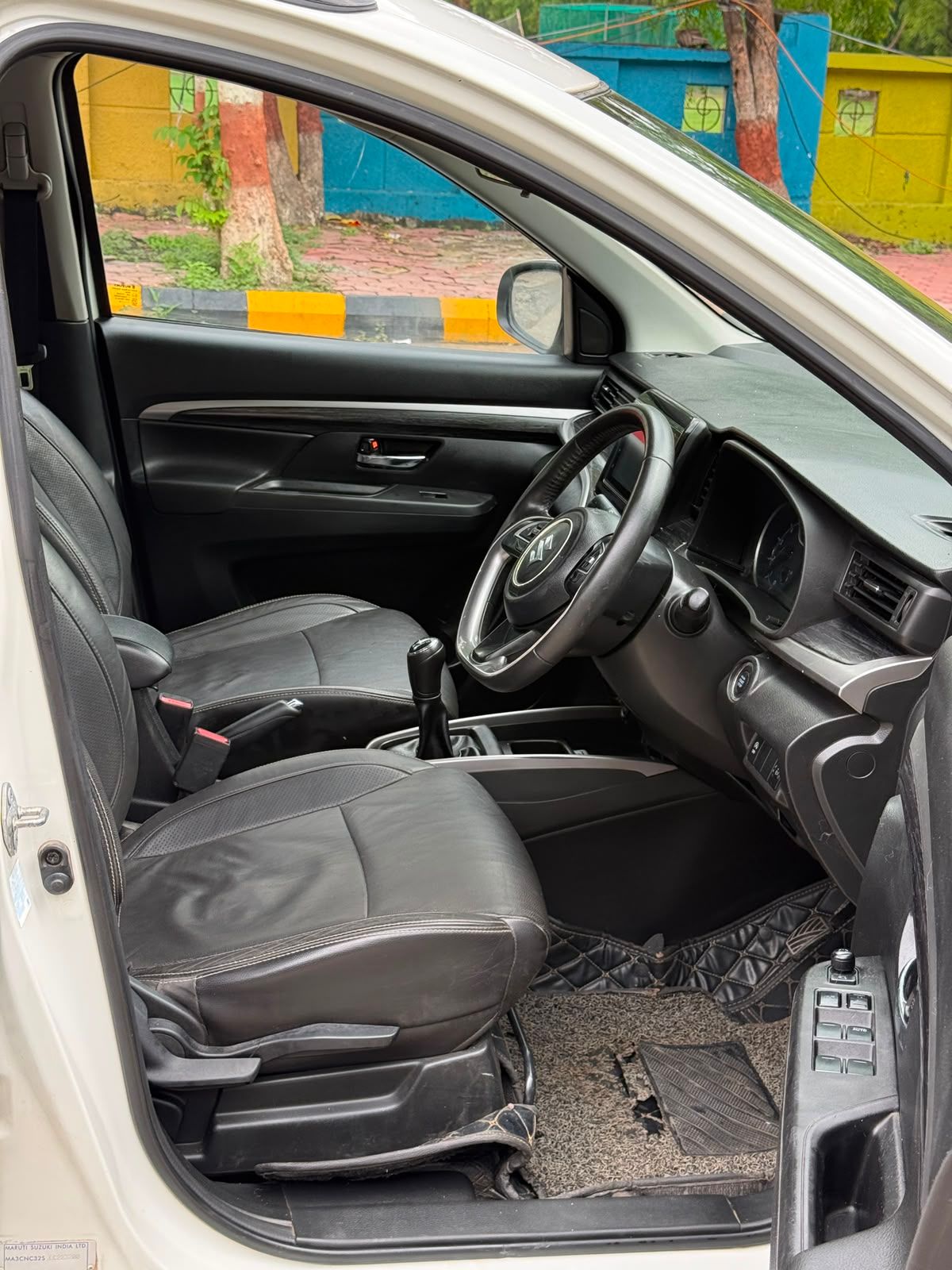 Maruti Suzuki XL6 — front seats and dashboard